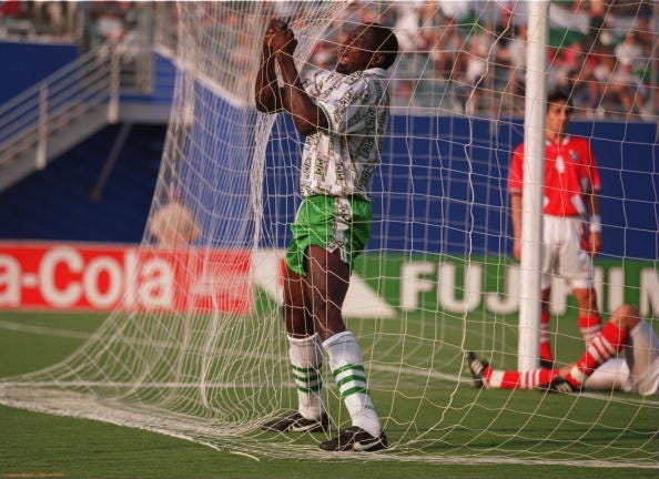 Who was the first Nigerian player to score in the World Cup