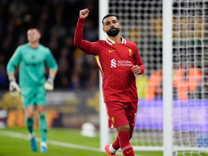 Liverpool Capitalize on City's Draw to Go Top of the Table with 2-1 Win Against Wolves