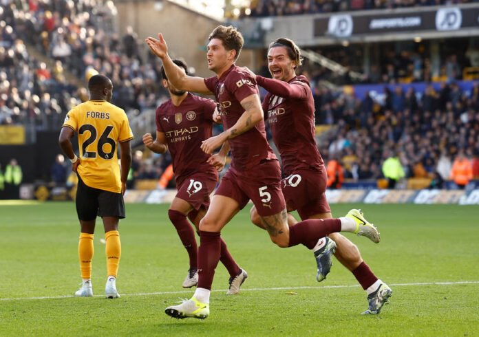 Stones Scores in Injury Time as City Beats Wolves 2-1 to Extend League Unbeaten Streak